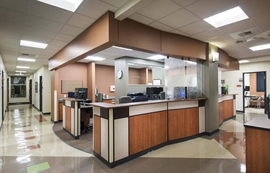 Reception desk with wood panelling