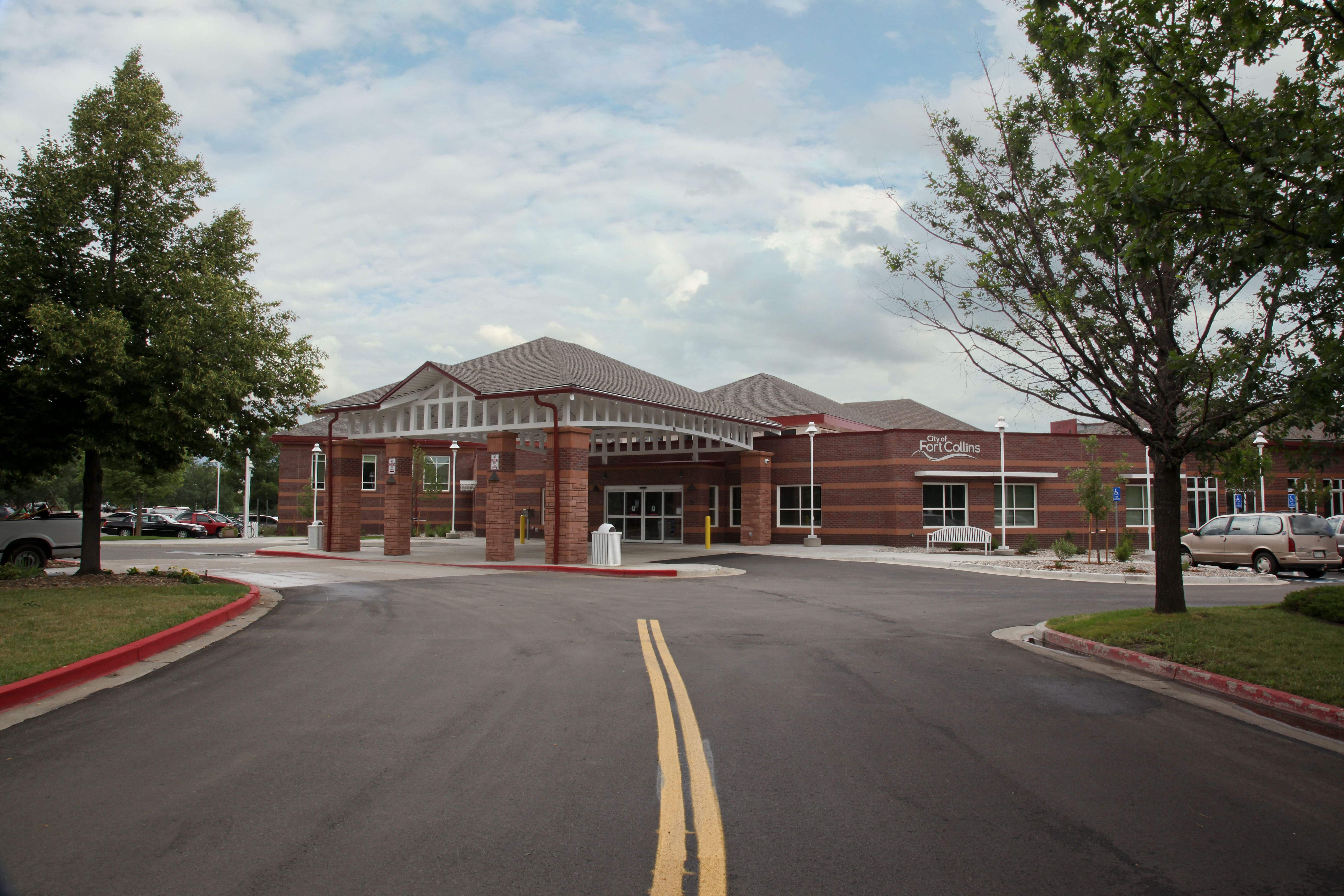 Large brick building with grey roof