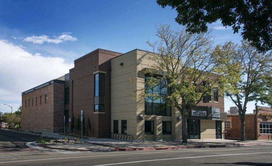 Building with trees in front