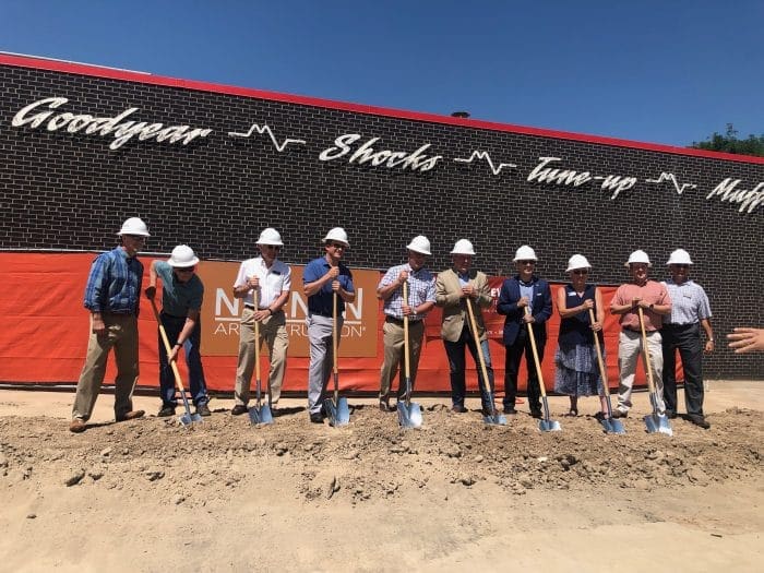 People holding shovels