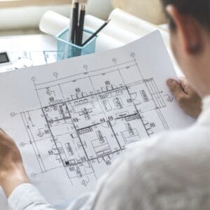 architect looking at plans